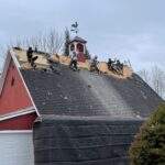 Vermont roofers working to make a roof repair last longer.