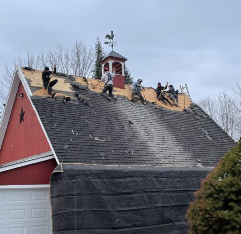 Vermont roofers working to make a roof repair last longer.