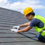 Roofing expert fixes home energy efficiency from damaged roof.