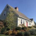 Inspect roof damage from the ground.