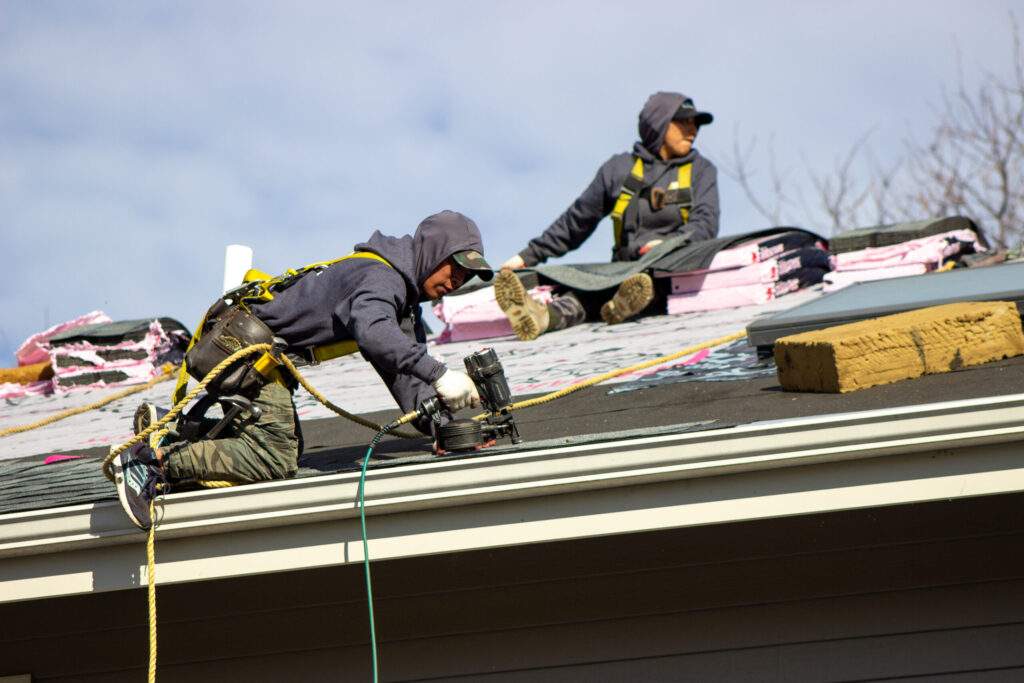 Local roofing contractors make roof repairs to fix roof damage.