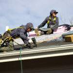 Local roofing contractors make roof repairs to fix roof damage.