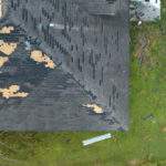 Roof with storm damage in need of roof repair from Vermont storm.