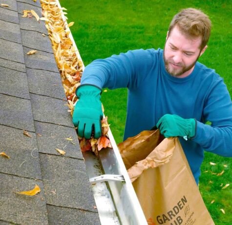 Gutter maintenance of cleaning leaves to extend roof life.